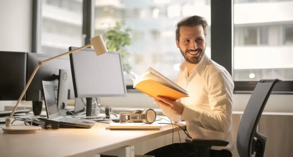 Man sitting and and enjoying office job