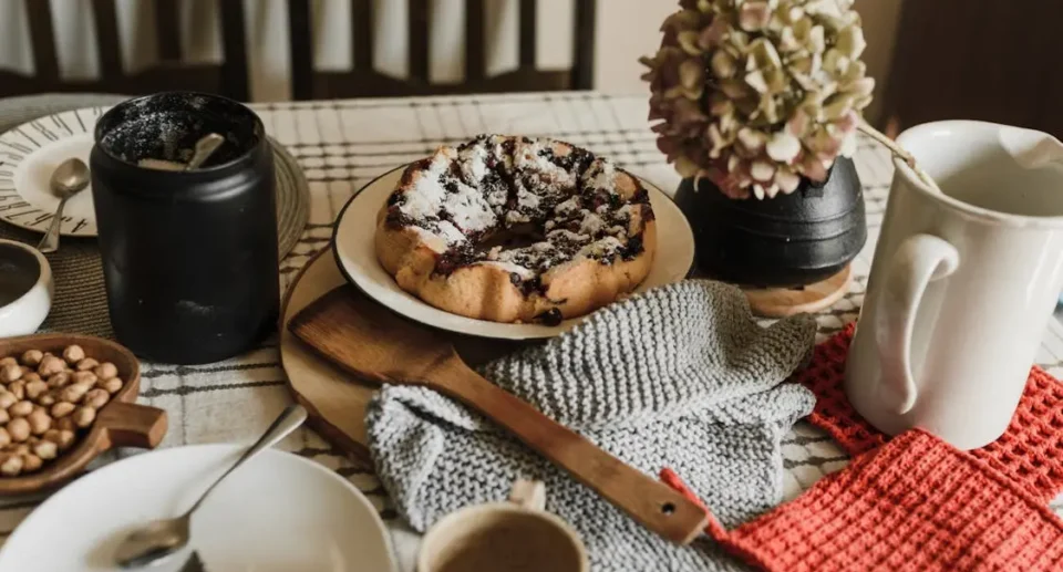 Boho tea party. Chocolate Cake on White Ceramic Plate